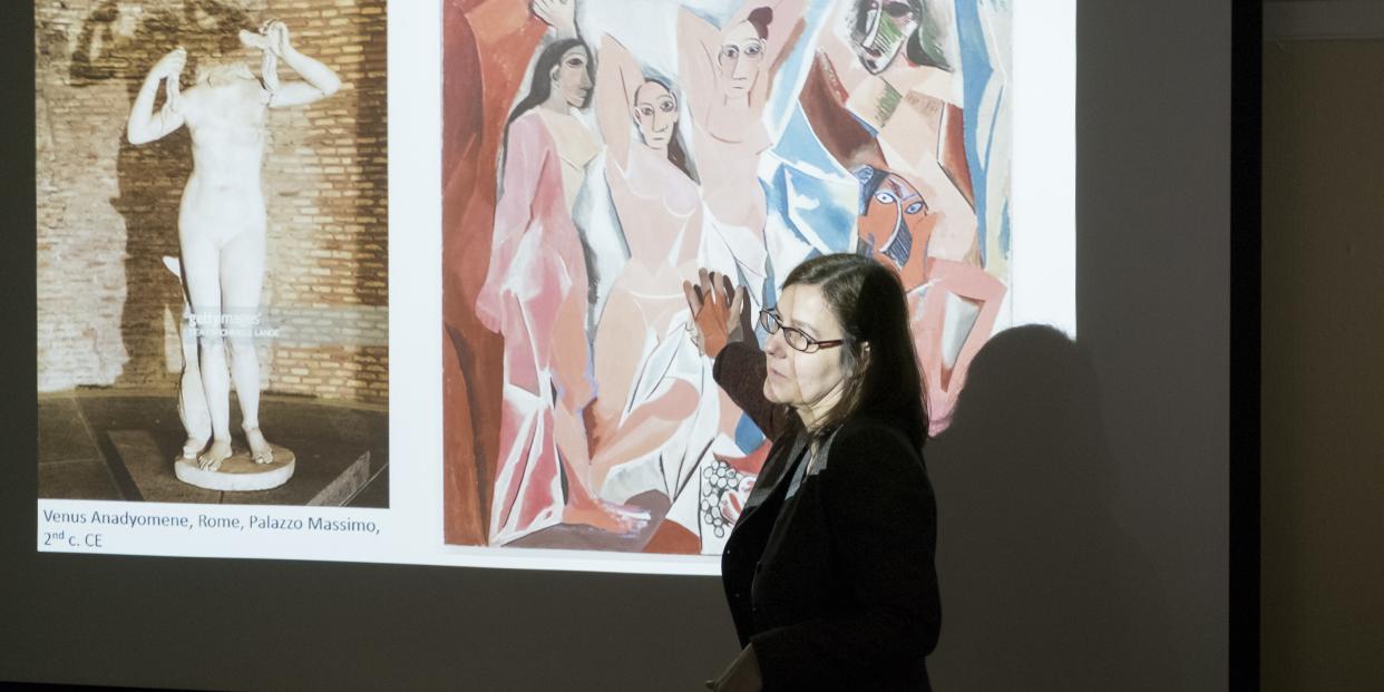 Professor Kriszta Kotsis teaches an art history class.