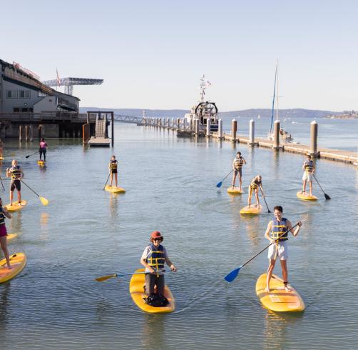 Students kayaking on Commencement Bay.