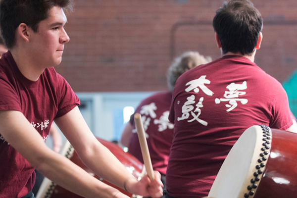 Members of the Taiko drum club perform in Marshall Hall