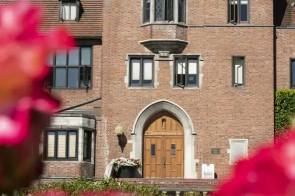 Brick building with flowers in front