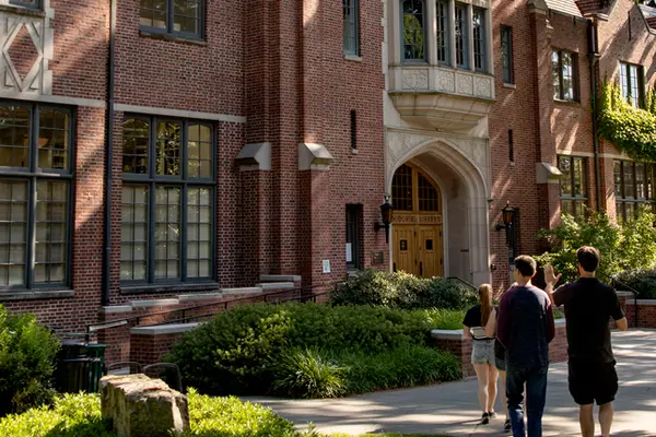 Students walking near the library