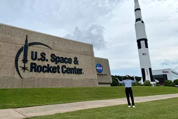 Kyra Lee ’24 in front of NASA's Marshall Space Flight Center