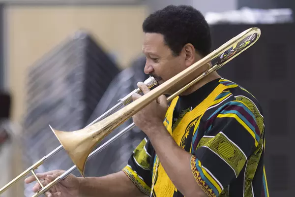 Jazz legend Delfeayo Marsalis plays trombone during rehearsal with the Puget Sound Jazz Orchestra