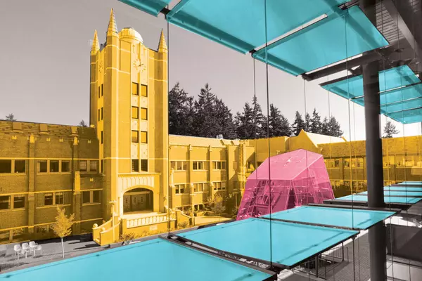 Thompson Hall in vibrant yellow, pink, and blue.