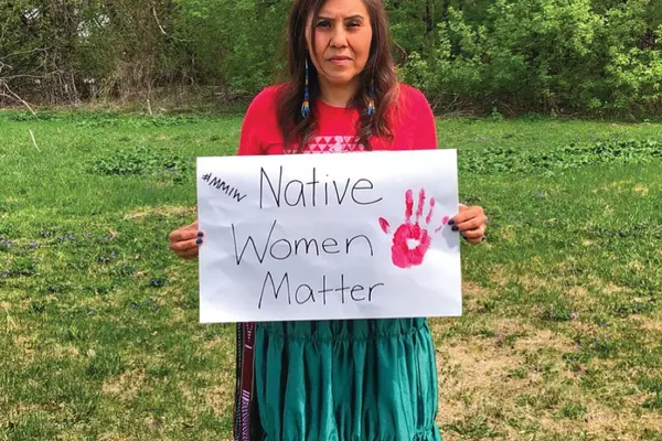 An activist raises awareness of missing and murdered Indigenous women.