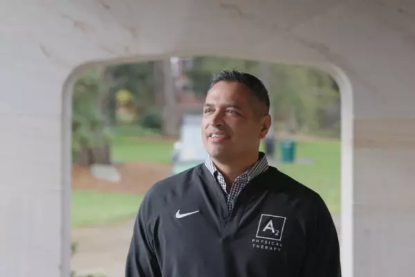 Alika Antone ’00, DPT’05 walks on campus.