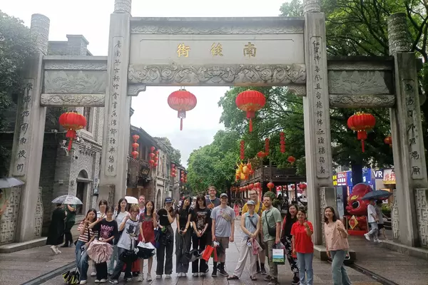 Students line up in China under red lanterns