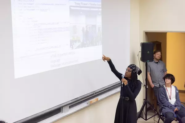 Summer Academic Challenge participant presents at the program's closing symposium in 2024.