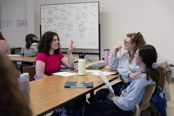 Assistant Professor Alexandria Drake speaks with students in her Connections 490 class on past pandemics.
