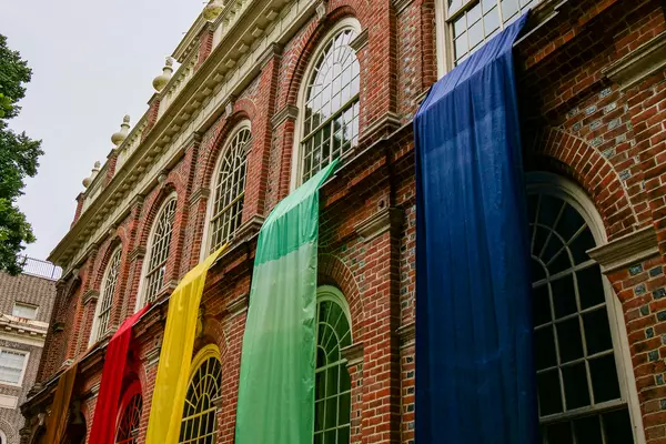 Pride flag on church walls