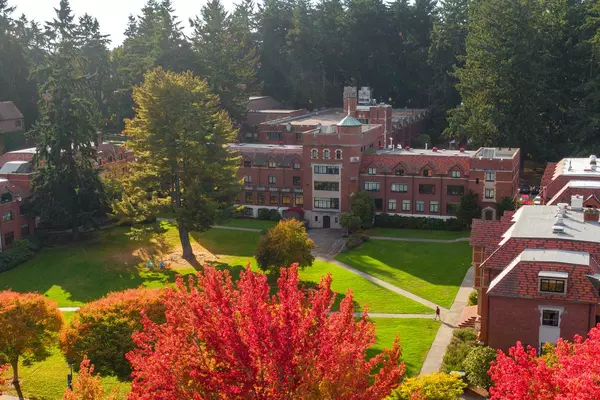 university campus with fall leaves