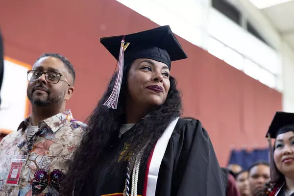 Woman in graduation regalia 