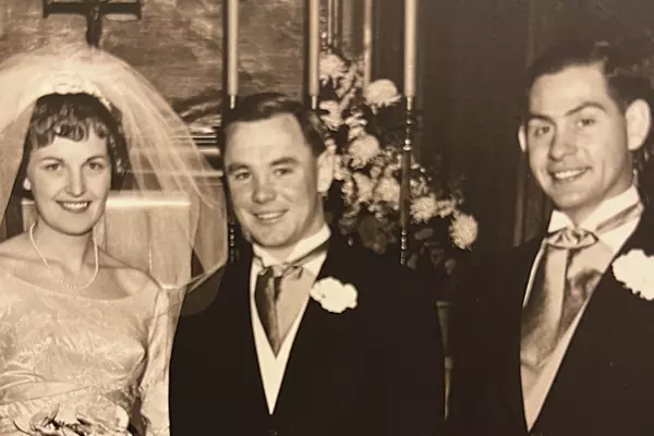 Doris Zoebel Fraser ’59 (left) and Richard (Dick) Shorten ’57 (right) with Doris' husband, Don Fraser (center) at their wedding in 1964.