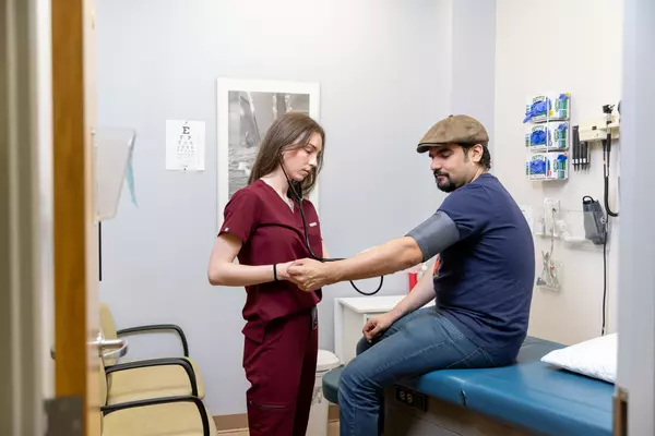 Cecilia Turetzky ’26 takes blood pressure at the Neighborhood Clinic.