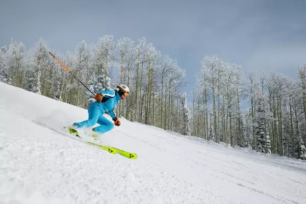 Skier goes down hill