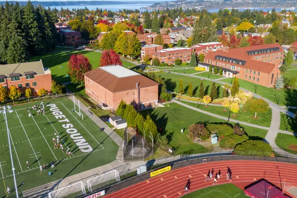 Drone's eye view of campus looking down at the track and Lower Baker Field, where scholar-athletes are practicing.