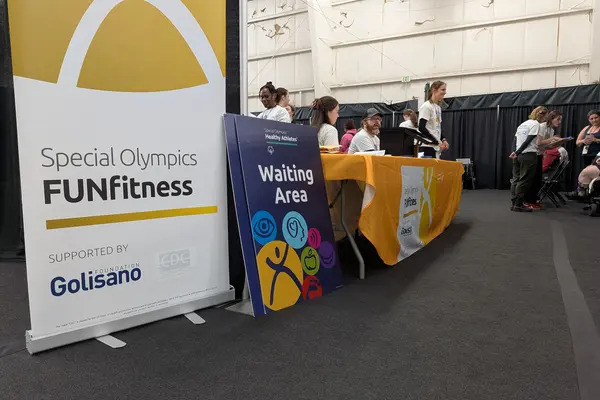 Special Olympics FUNfitness sign at entrance.