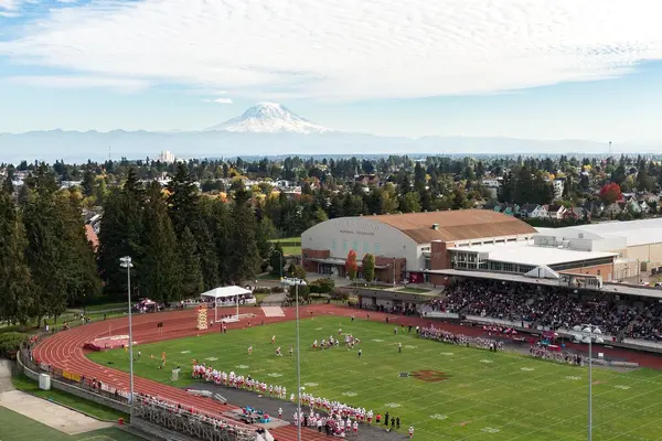 Baker Stadium and Memorial Fieldhouse with Mount Rainier in the background