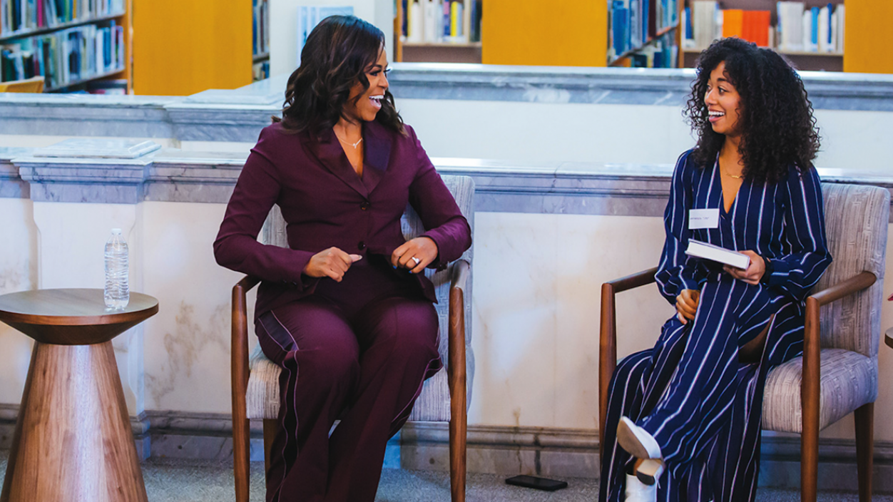 Michelle Obama and Lestraundra Alfred '11 at a book club meeting in Seattle