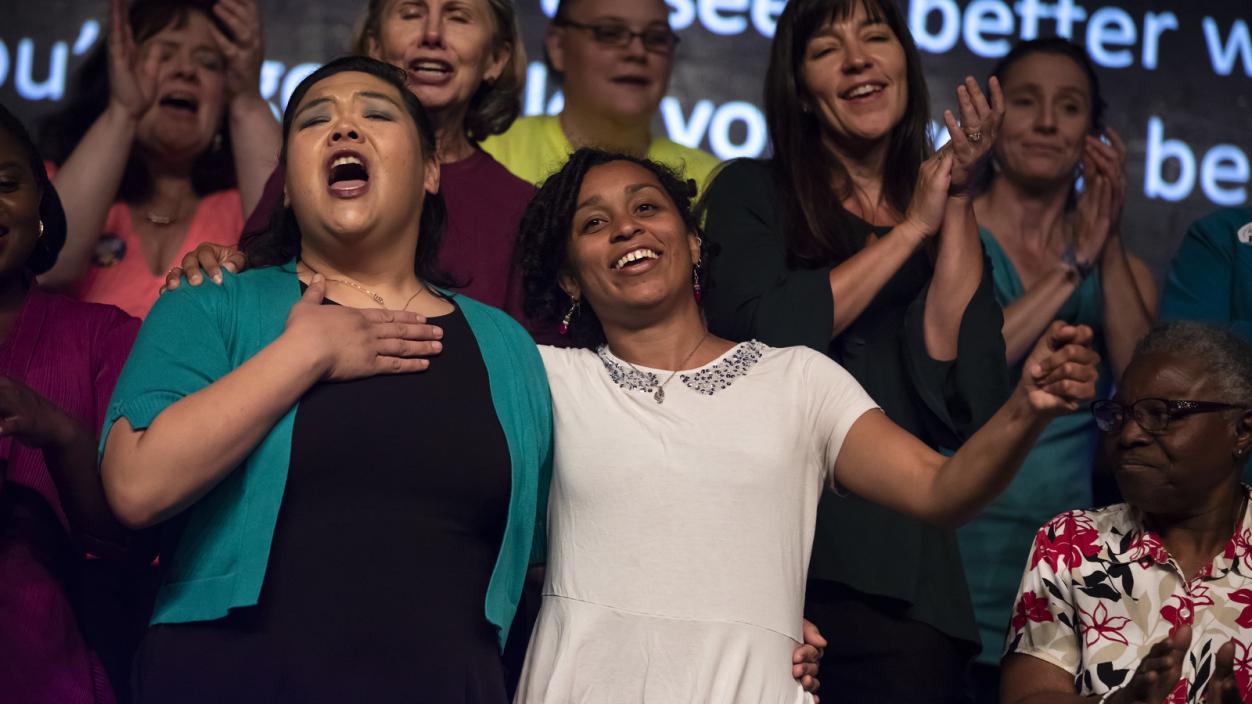 Members of the Tacoma Refugee Choir perform at the Race and Pedagogy National Conference in September 2018