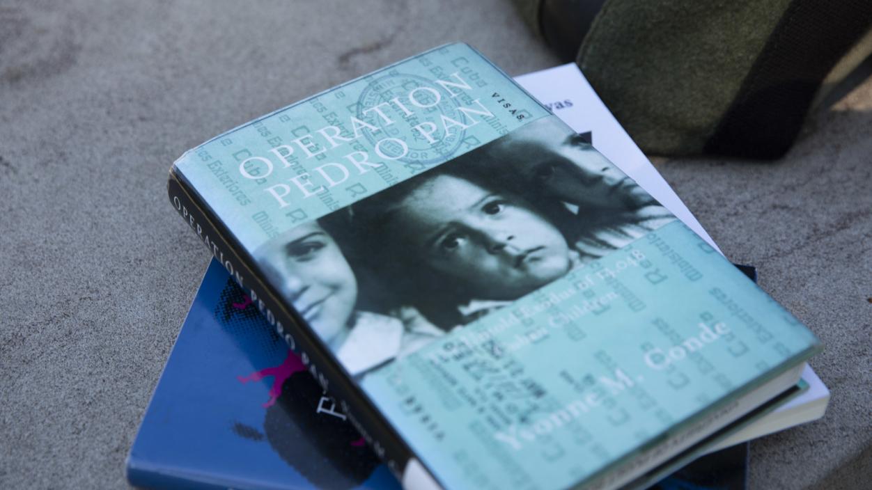 Stack of books, with "Operation Pan Pedro" on top