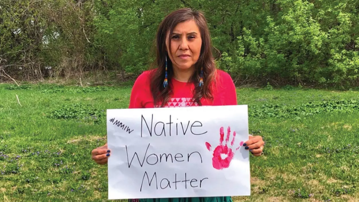 An activist raises awareness of missing and murdered Indigenous women.