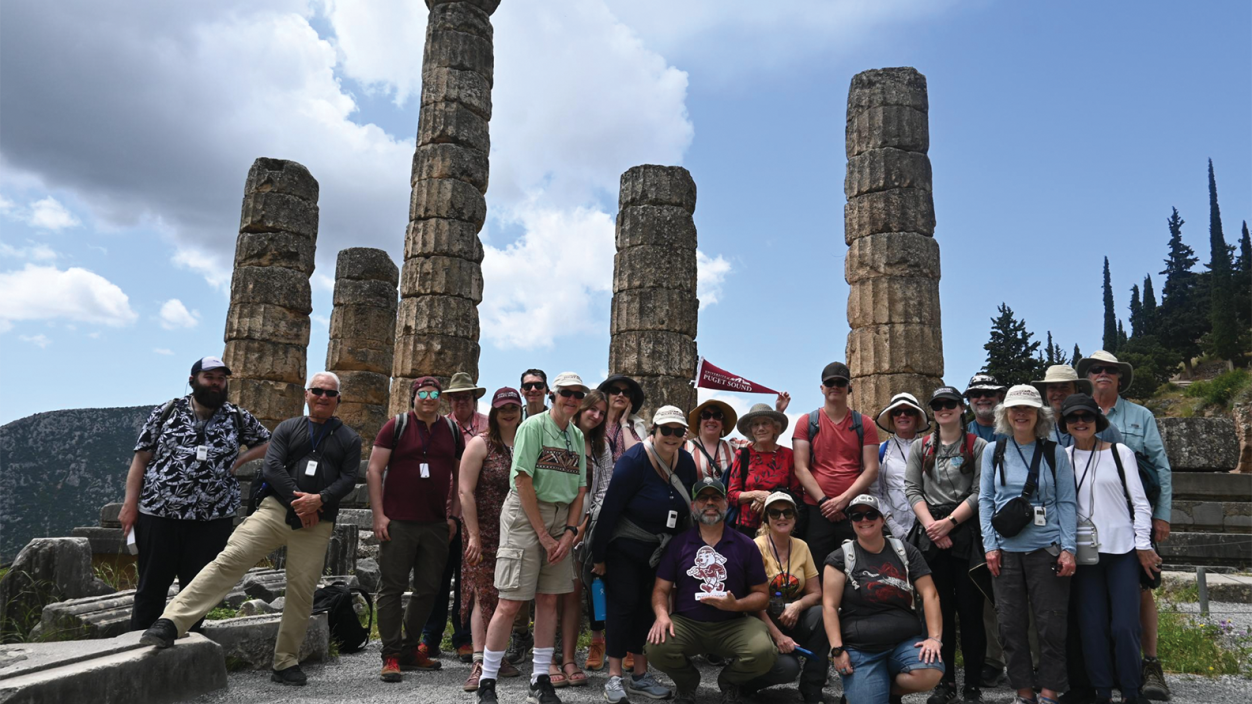 The alumni tour group at the Temple of Apollo in Greece.
