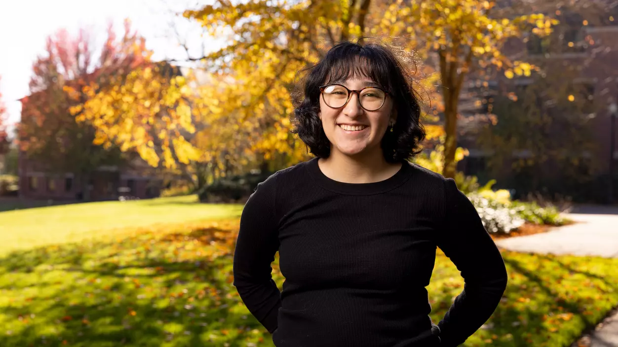 Angela Ronces-Cortes ’24 outside Wyatt Hall on a fall day.
