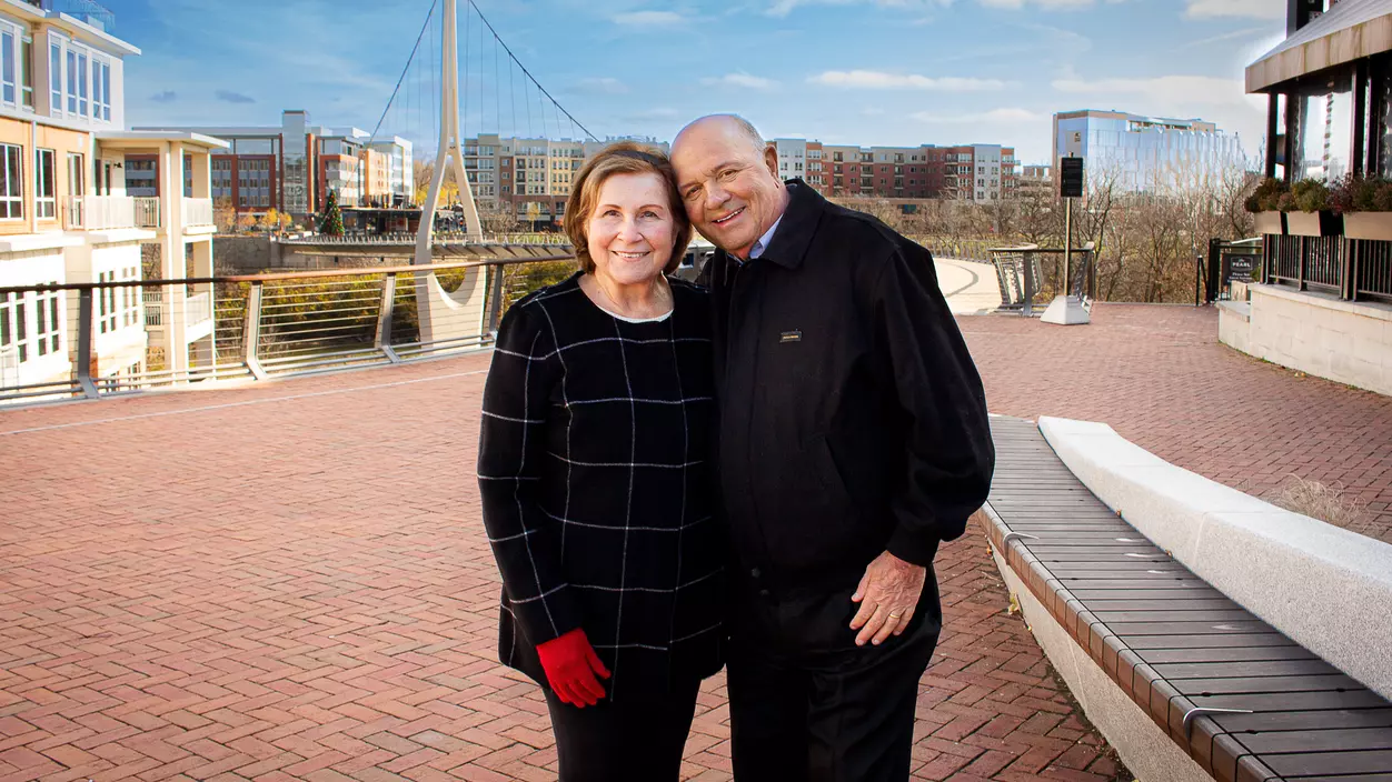 Louis Slangen ’69 (right, pictured here with his wife, Linda) 
