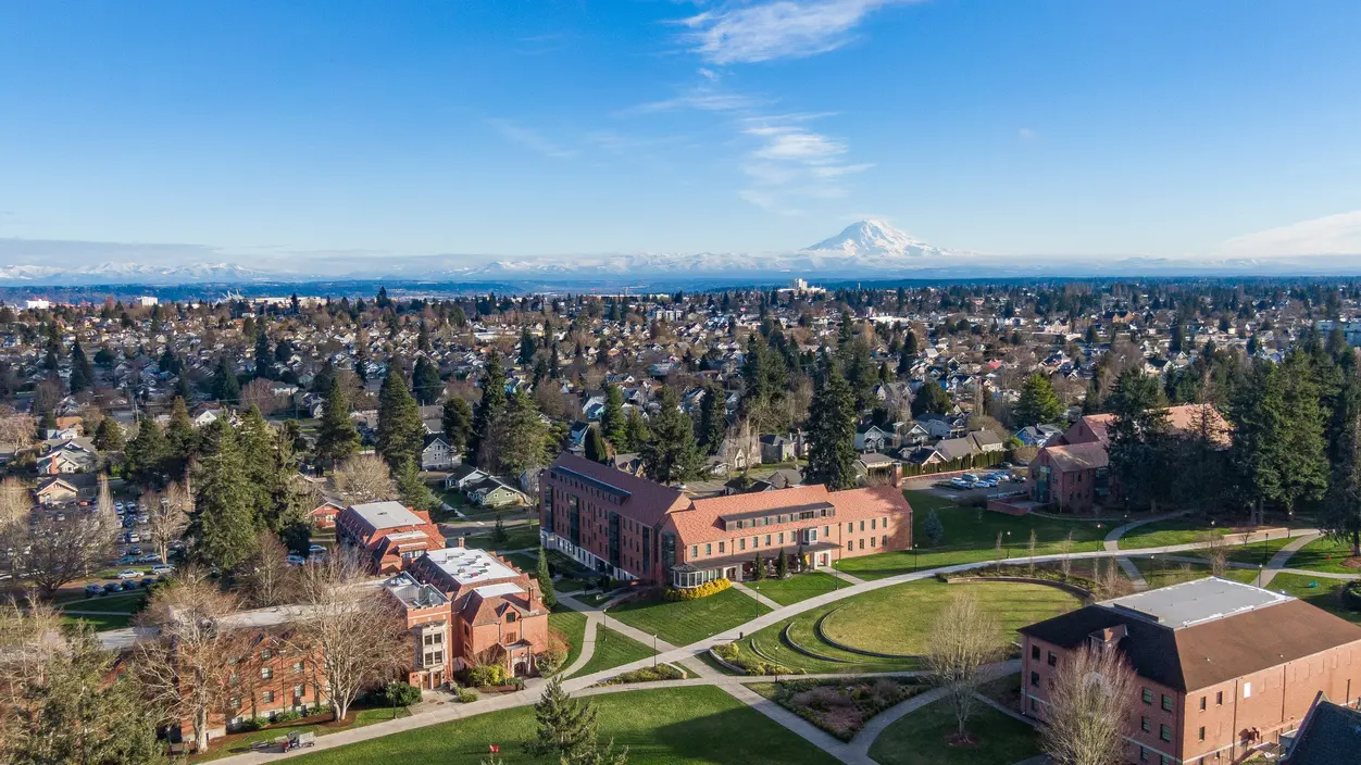 Aerial view of campus with Mount Rainier in the distance