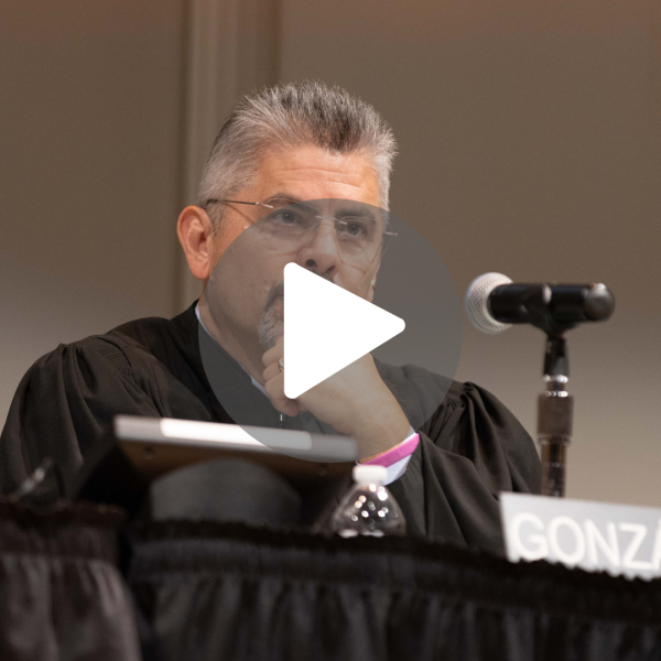 Washington State Supreme Court justice with play button