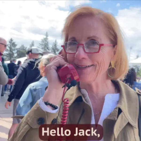 Graduate families leave messages for graduates on a telephone.
