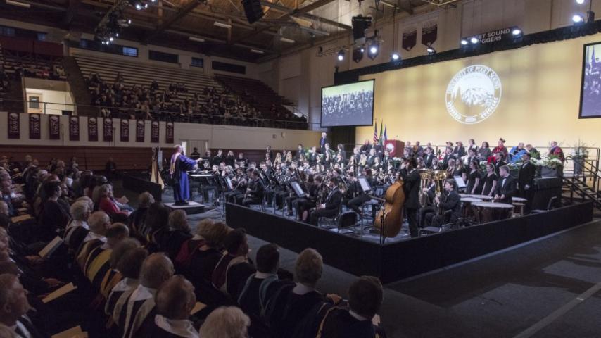 The Wind Ensemble, directed by Gerard Morris, performs at the Installation Ceremony. Photo by Ross Mulhausen.