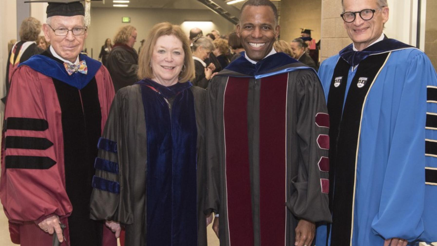 Four university presidents, all together for a day of celebration: Phil Phibbs, Susan Resneck Pierce, Isiaah Crawford, and Ron Thomas. Photo by Ross Mulhausen.