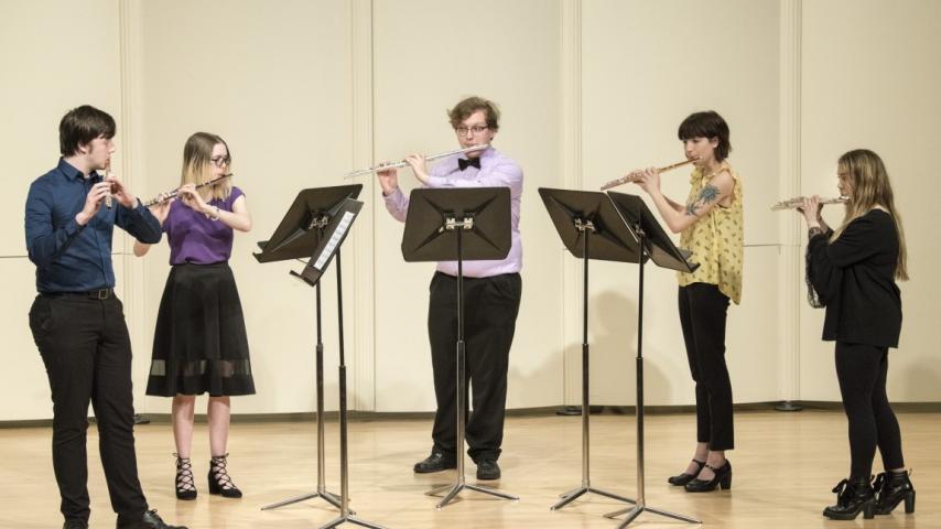 Five flute players with this instruments