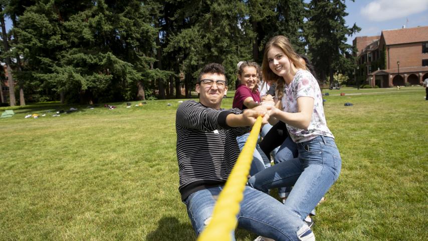 Students take part in a tug-of-war event during orientation