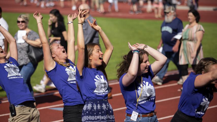Orientation leaders gear up the crowd at Baker Stadium