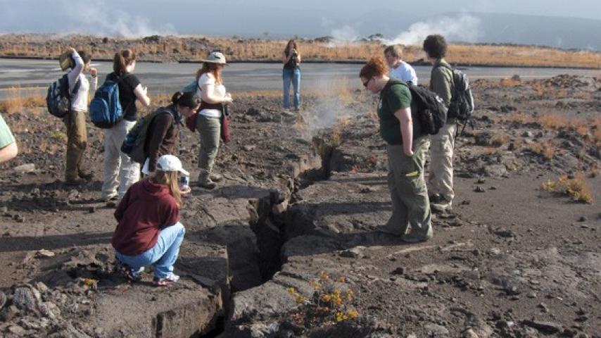 People looking at volcanic activity