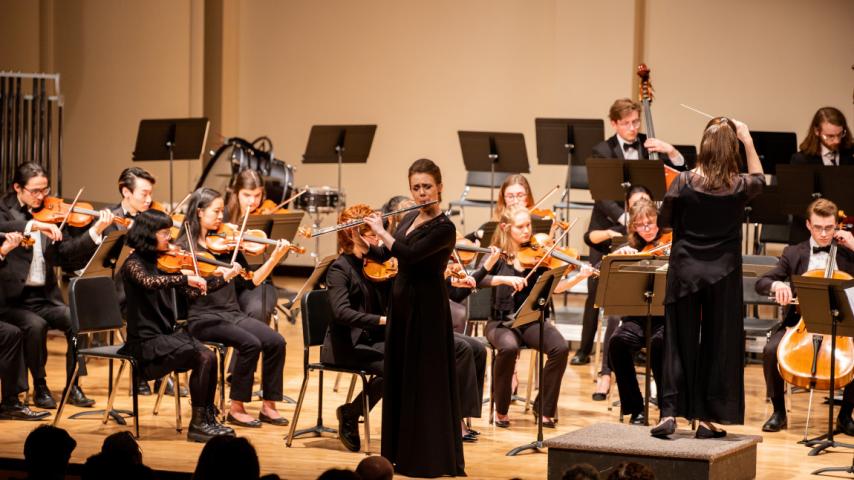 Symphony Orchestra performing on a stage