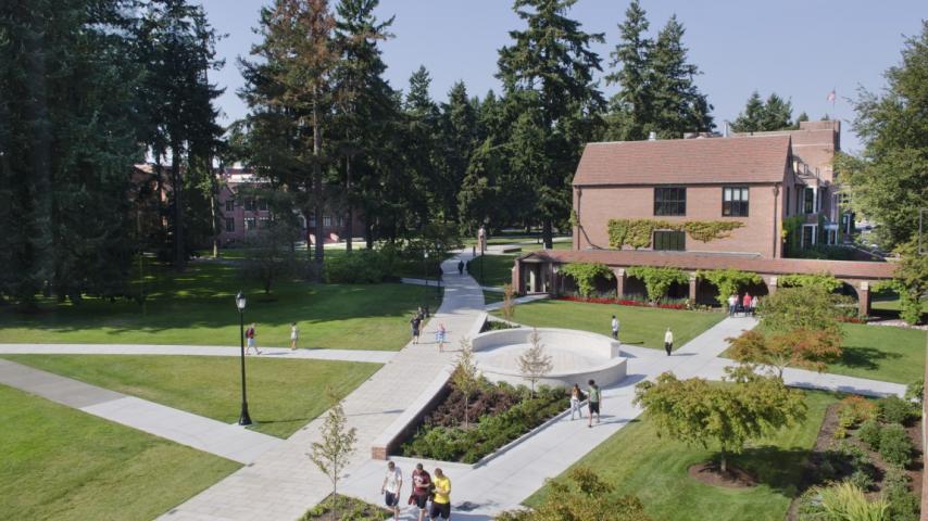 View over the Benefactor Plaza and campus on a vibrant sunny day