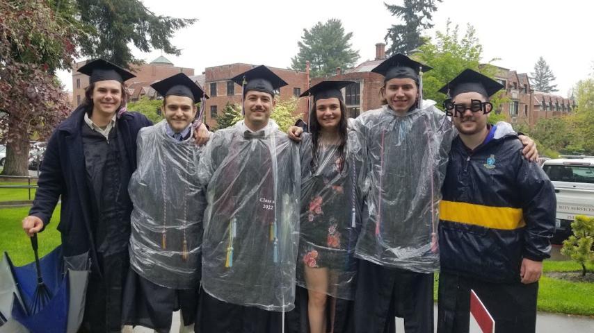 Conner Steen, Charlie Standish, Dan Simoes, Kylee Roath, Bryce Poplawsky and one unidentified student pose for photo.