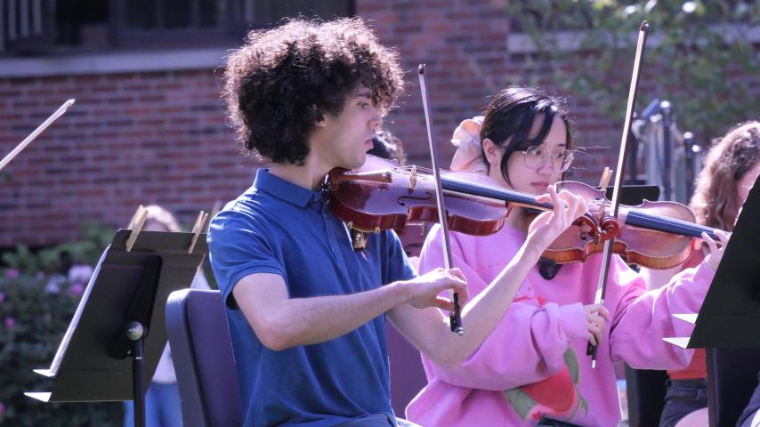 Students performing in the annual Pops on the Lawn concert, spring, 2022.