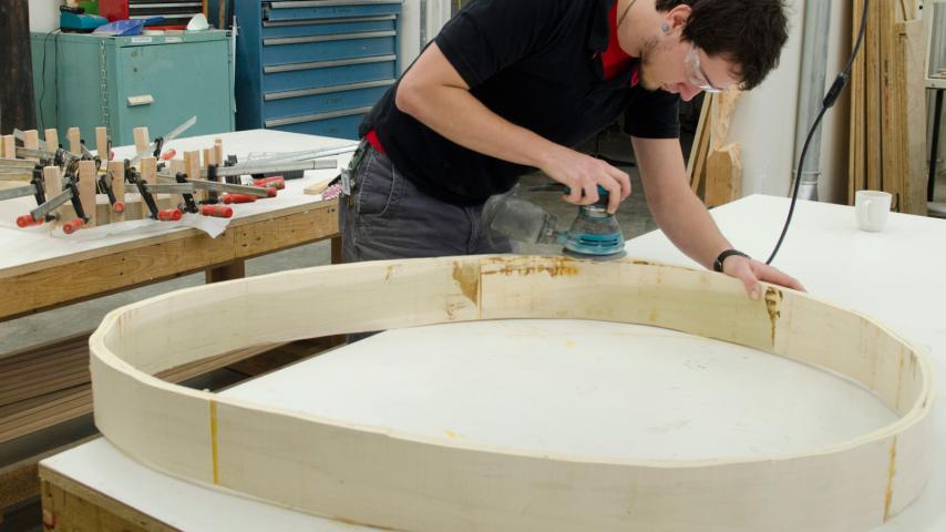 Student working on a sculptural piece in the studio