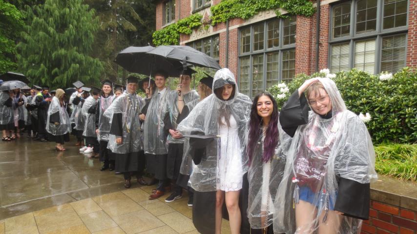 Chemistry Graduates Enjoying Rain 