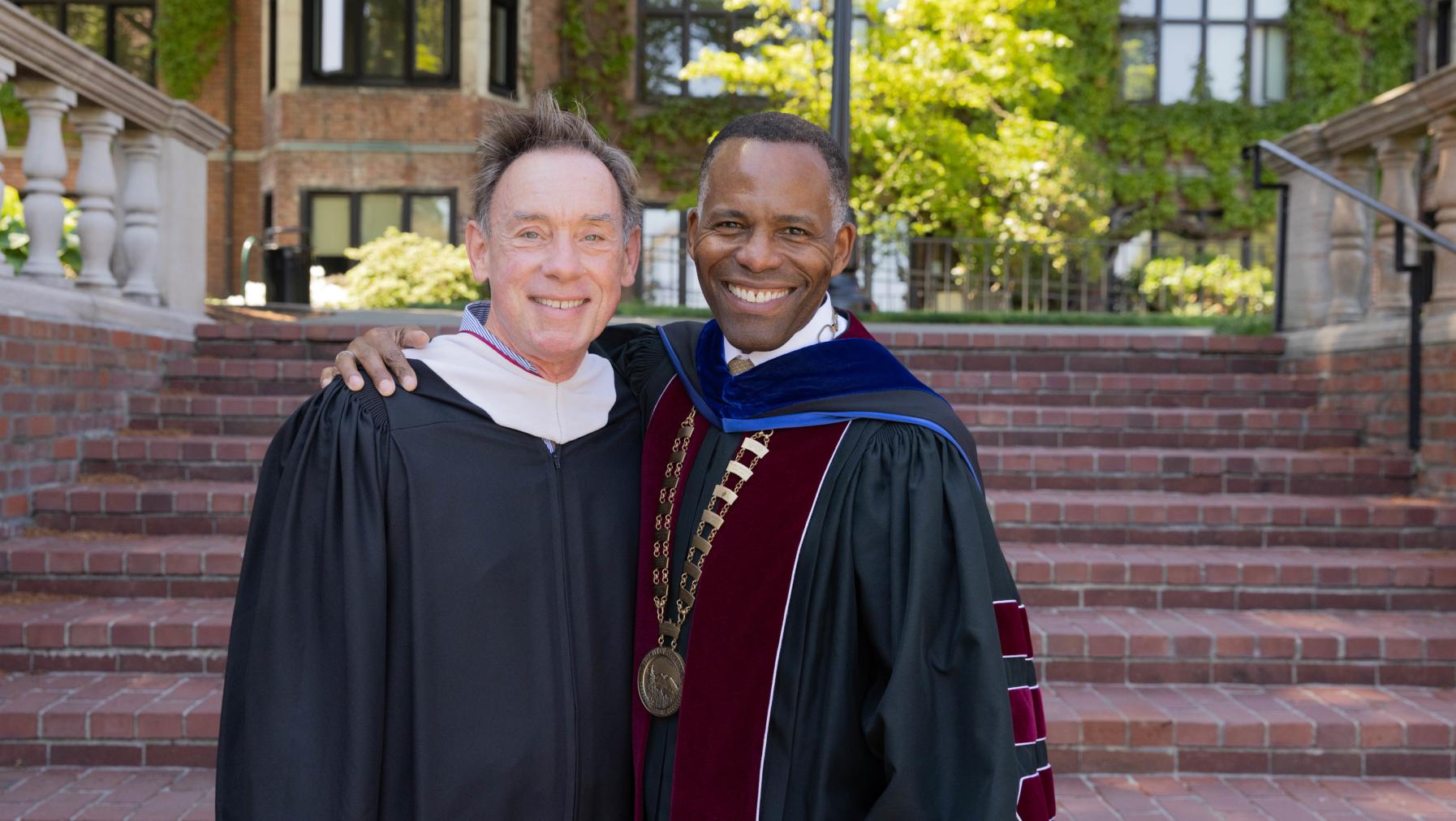 President Crawford and Chair of the Board of Trustees Robert Pohlad P'07 prepare for Commencement.