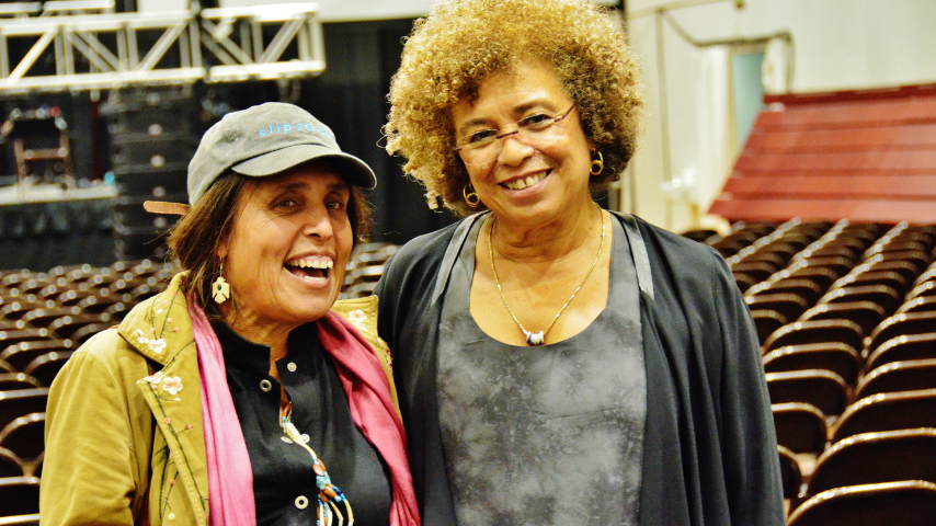 Winona LaDuke and Angela Davis photographed together at the completion of the 2014 RPNC in the Memorial Fieldhouse. 