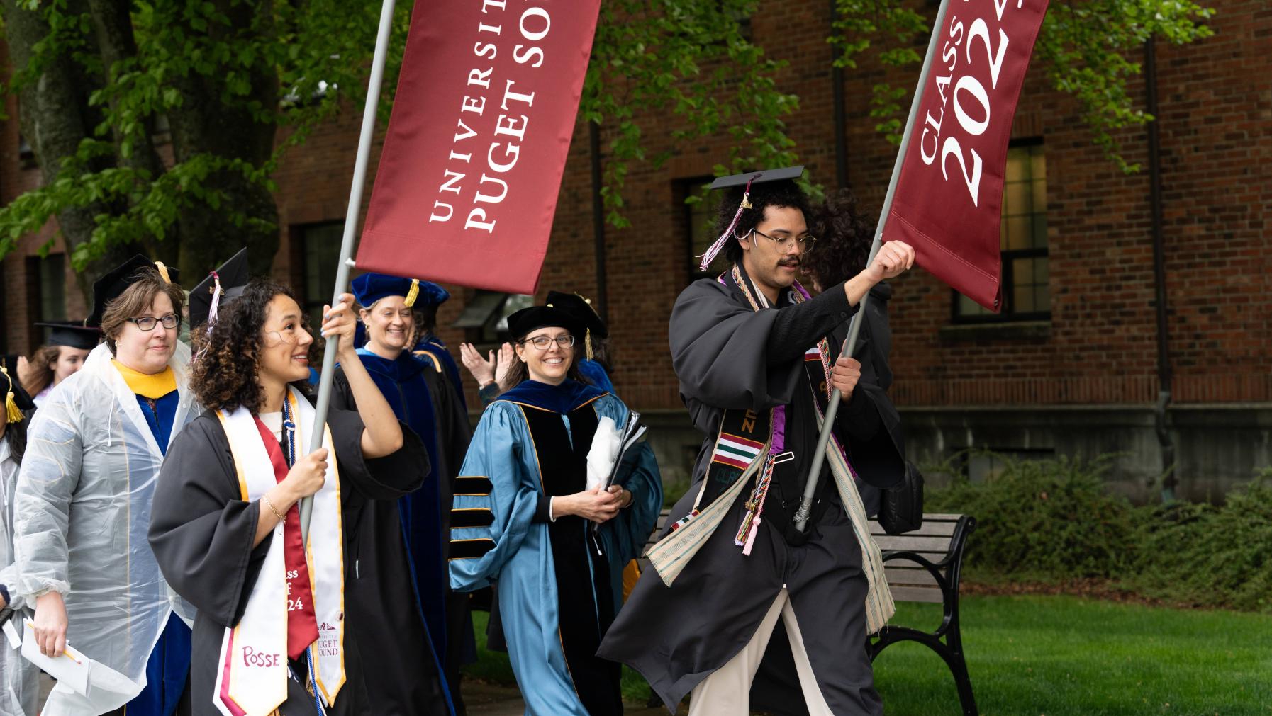 The walk to Baker Stadium for Commencement 2024
