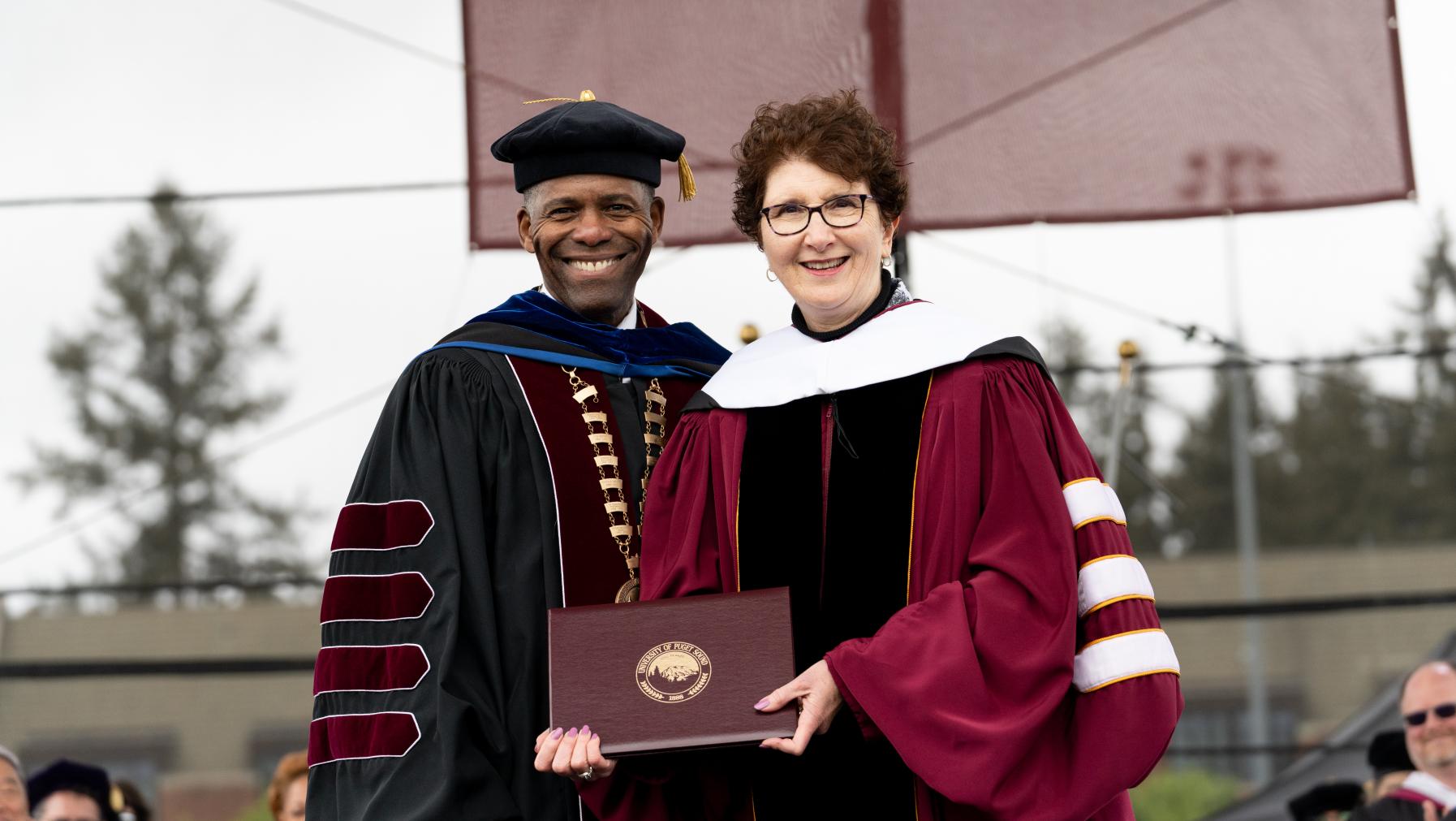 President Crawford presents an honorary degree.