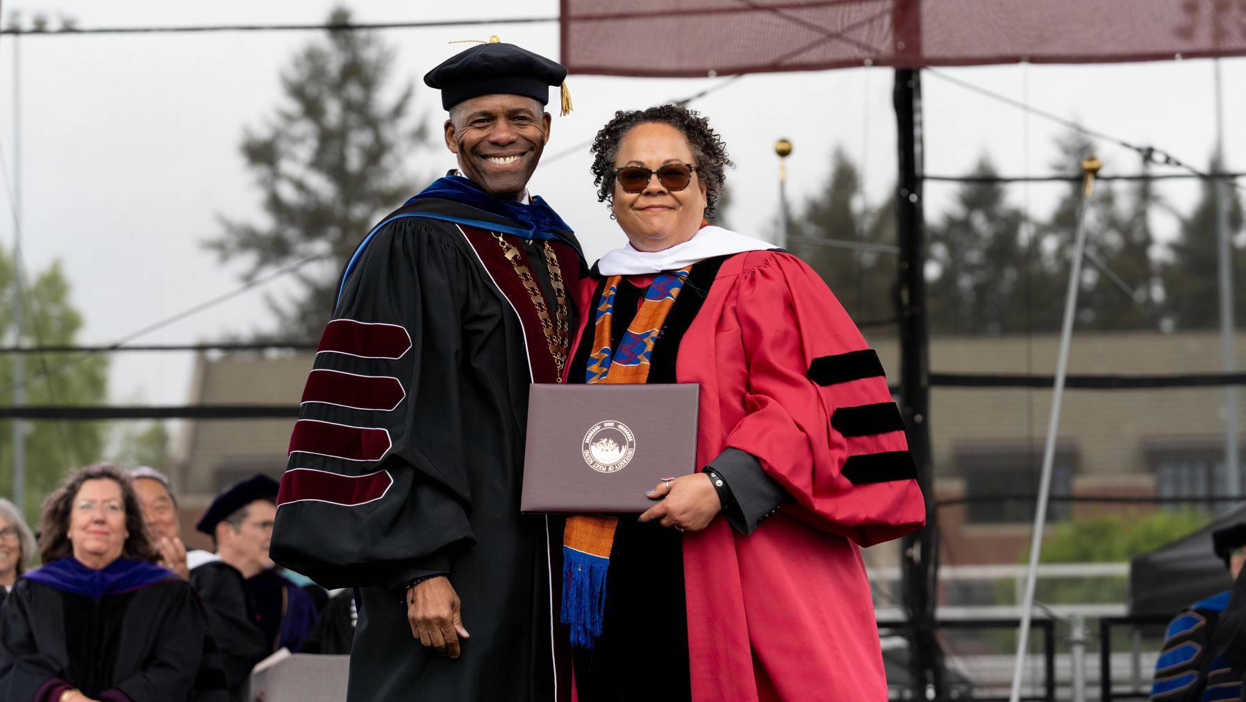 President Crawford presents an honorary degree.