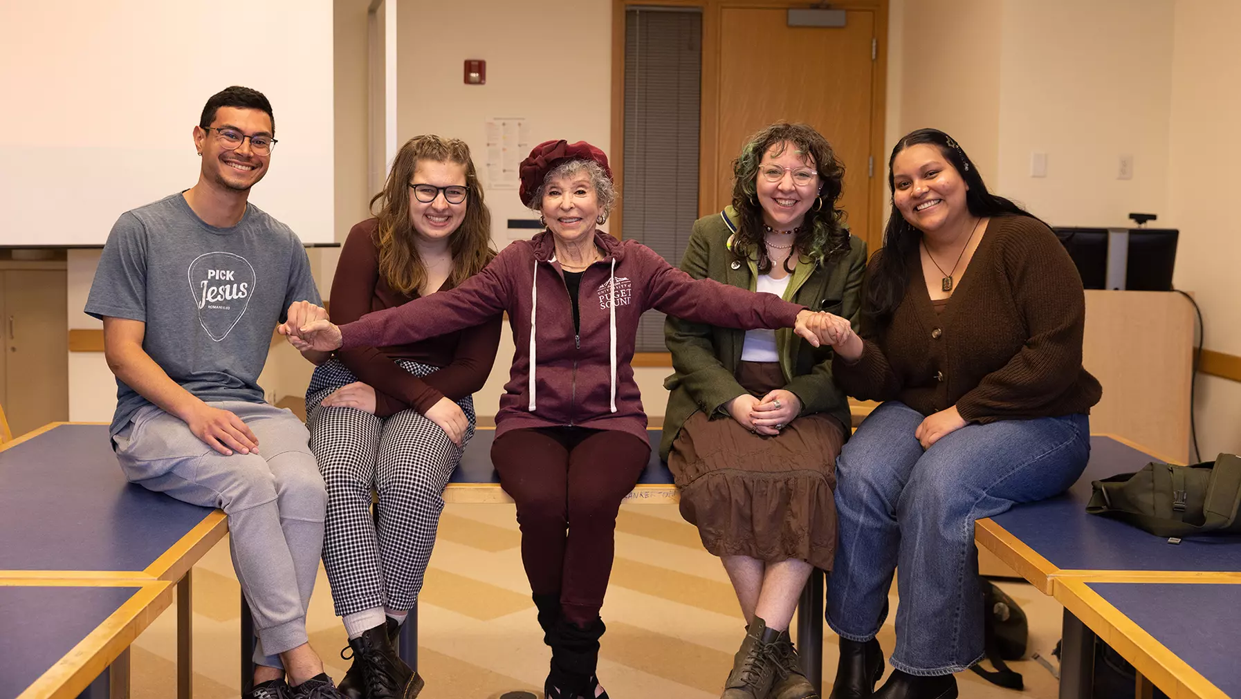 Rita Moreno interacts with students of Professor Andrew Gomez in a classroom visit.